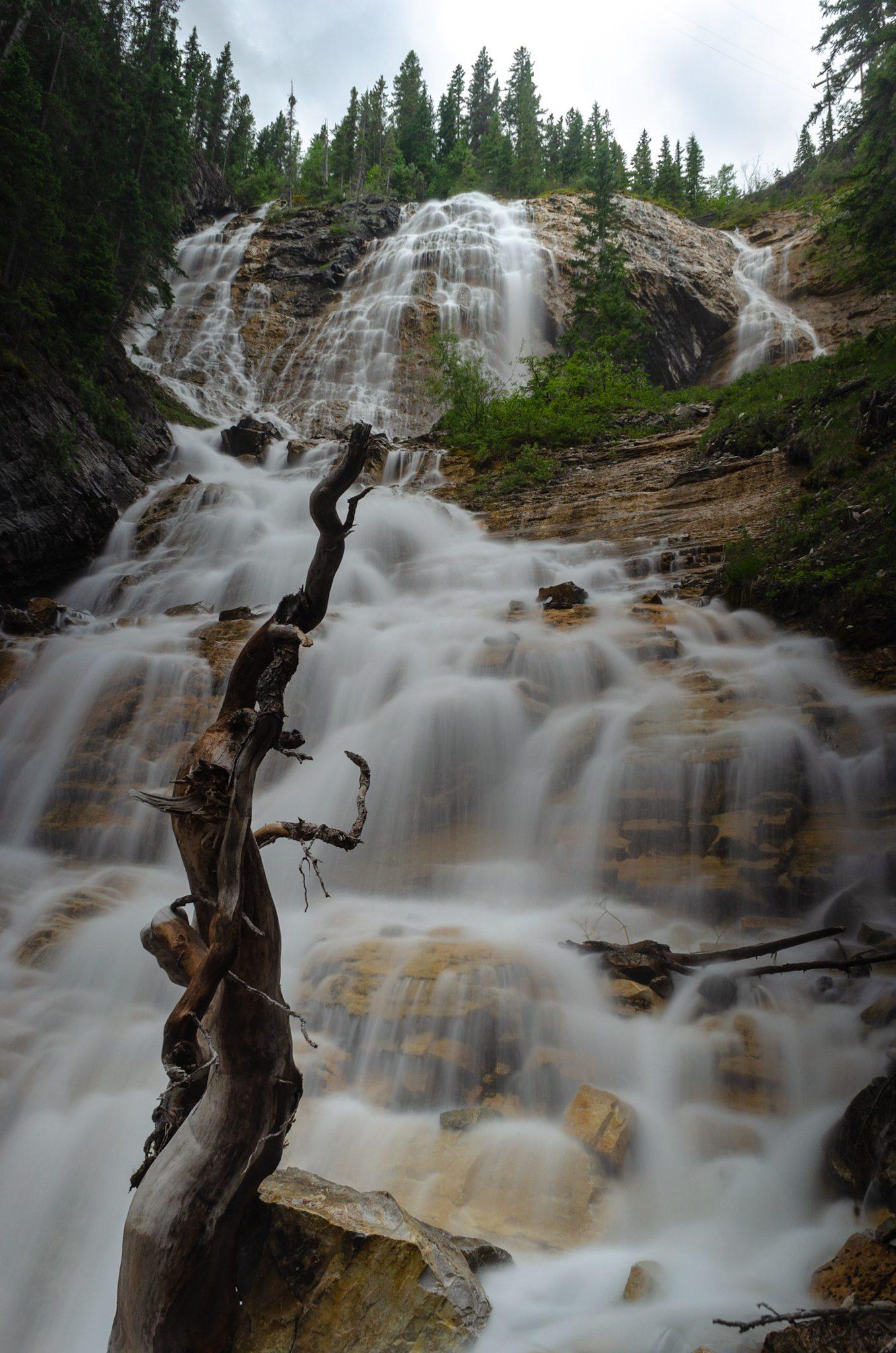 Long-exposure waterfall on the Grassi Lakes trail near Canmore